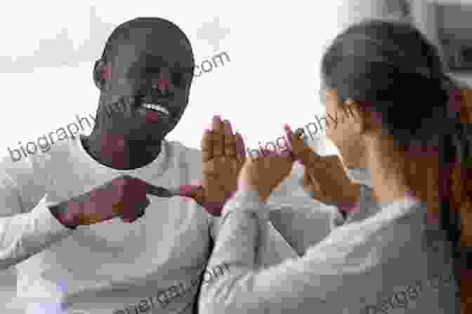 A Group Of Deaf People Signing And Interacting With Each Other The Oxford Handbook Of Deaf Studies Language And Education Volume 1 (Oxford Library Of Psychology)