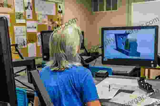 A Student Working On A Computer Aided Design Project Exploring Engineering: An To Engineering And Design