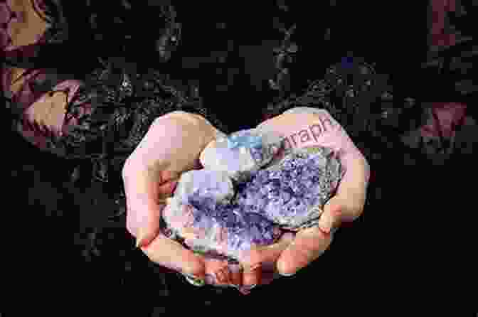 Close Up Of A Hand Holding A Cluster Of Amethyst Crystals, Emanating A Soft, Ethereal Glow The Magick Of Crystals: A Guide To Mastering Astral Projections